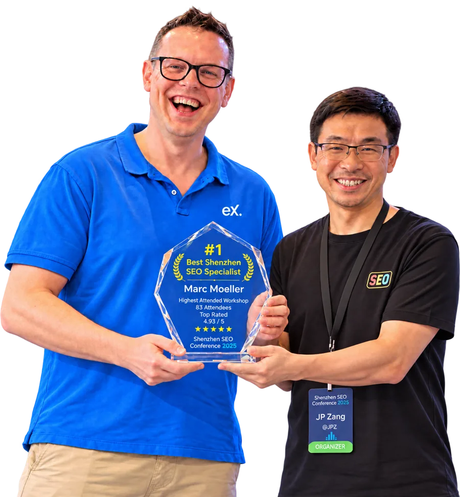 Marc Moeller receiving the #1 Best Shenzhen SEO Specialist award from JP Zhang at the Shenzhen SEO Conference 2025